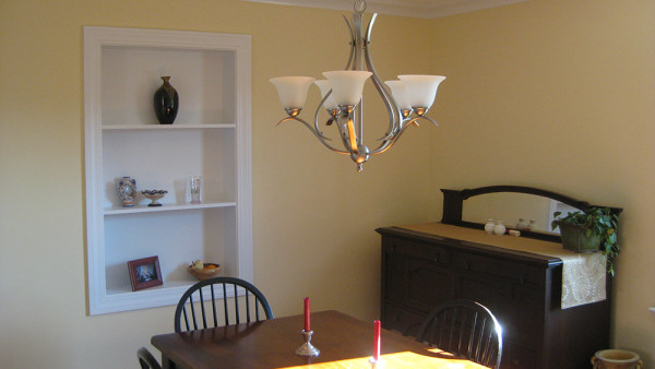 Dining-room-with-Crown-Molding-and-Built-In-Shelves